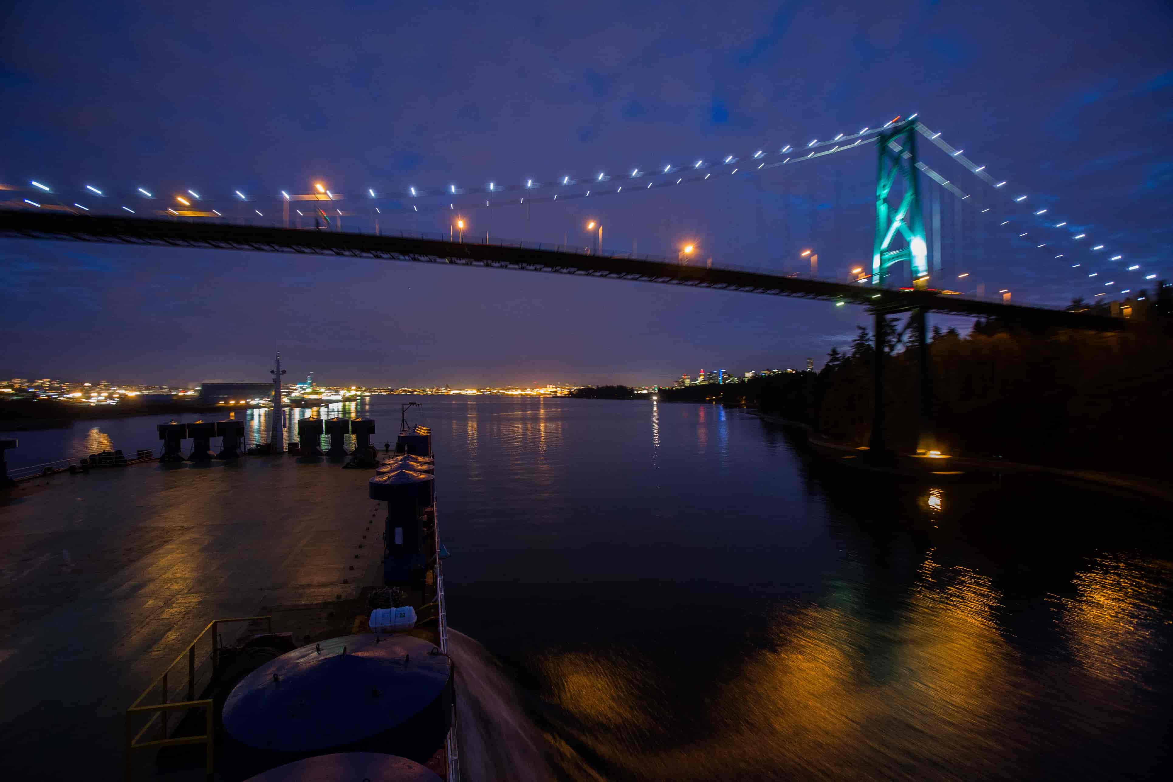 Ship going under a bridge